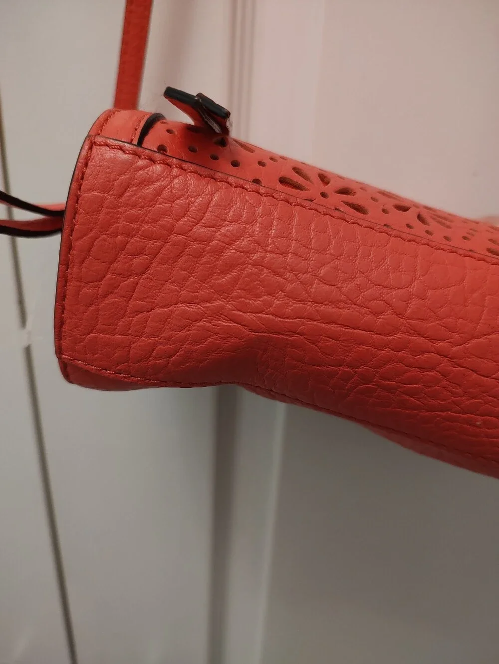 Kate Spade Coral Pink Leather Crossbody Bag with Floral Cutout